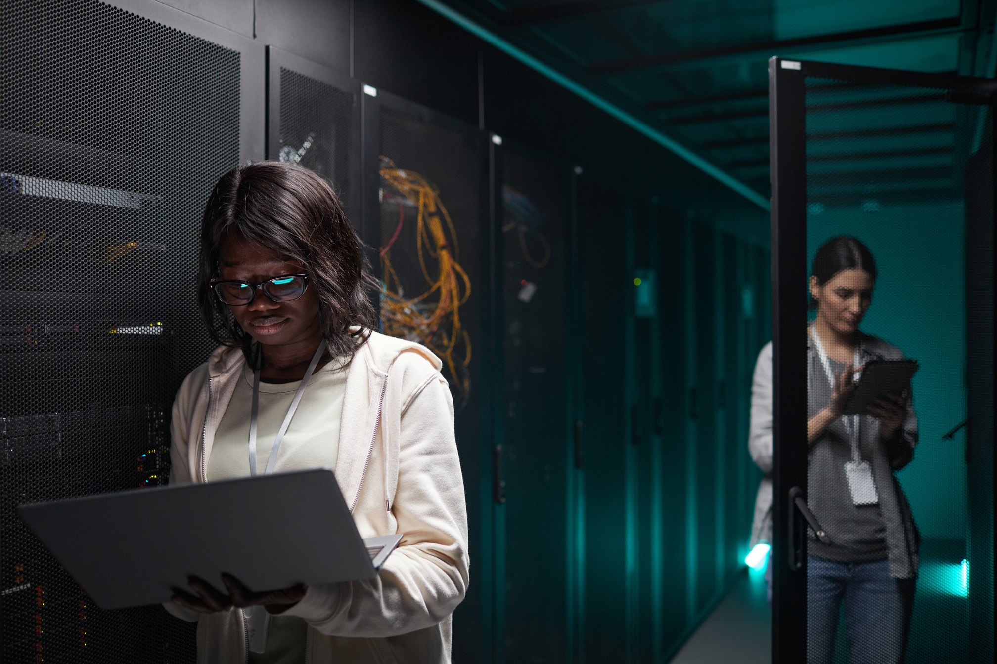 Young African American Woman Working in Data Center
